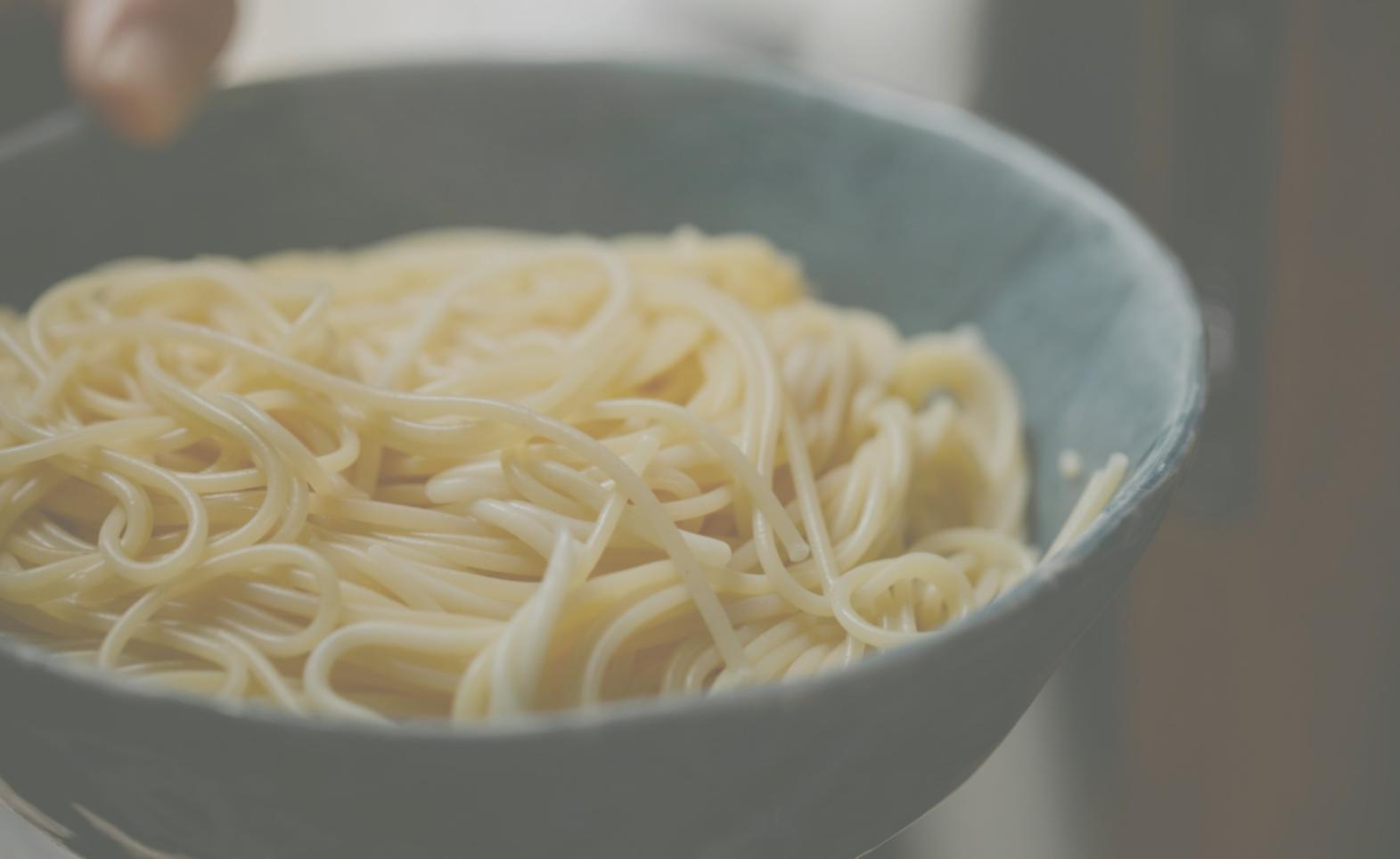 Detailed view of menu planning materials and culinary preparation work